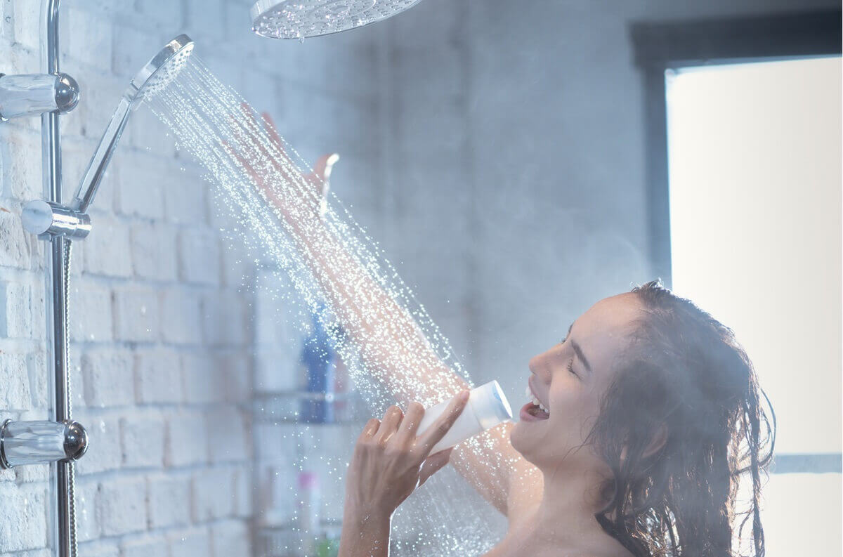 Woman taking a bath and singing